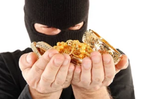 Robber Holding Jewelry