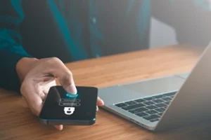 man-laptop-locked-phone
